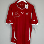 Shop 2010/11 SWITZERLAND *BNWT* SQUAD SIGNED HOME SHIRT (XL) PUMA, classic football shirts, vintage football shirts & retro soccer jerseys at Cult Kits