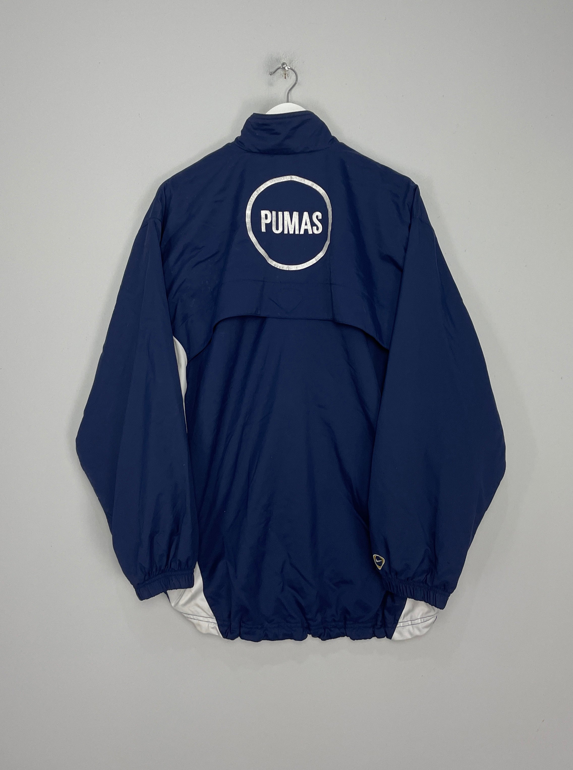 Shop 2001/02 UNAM PUMAS TRACK JACKET (L) NIKE, classic football shirts, vintage football shirts & retro soccer jerseys at Cult Kits