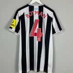 Shop 2022/23 Newcastle United Botman #4 *BNWOT* Home Shirt (Multiple Sizes) Castore, classic football shirts, vintage football shirts & retro soccer jerseys at Cult Kits