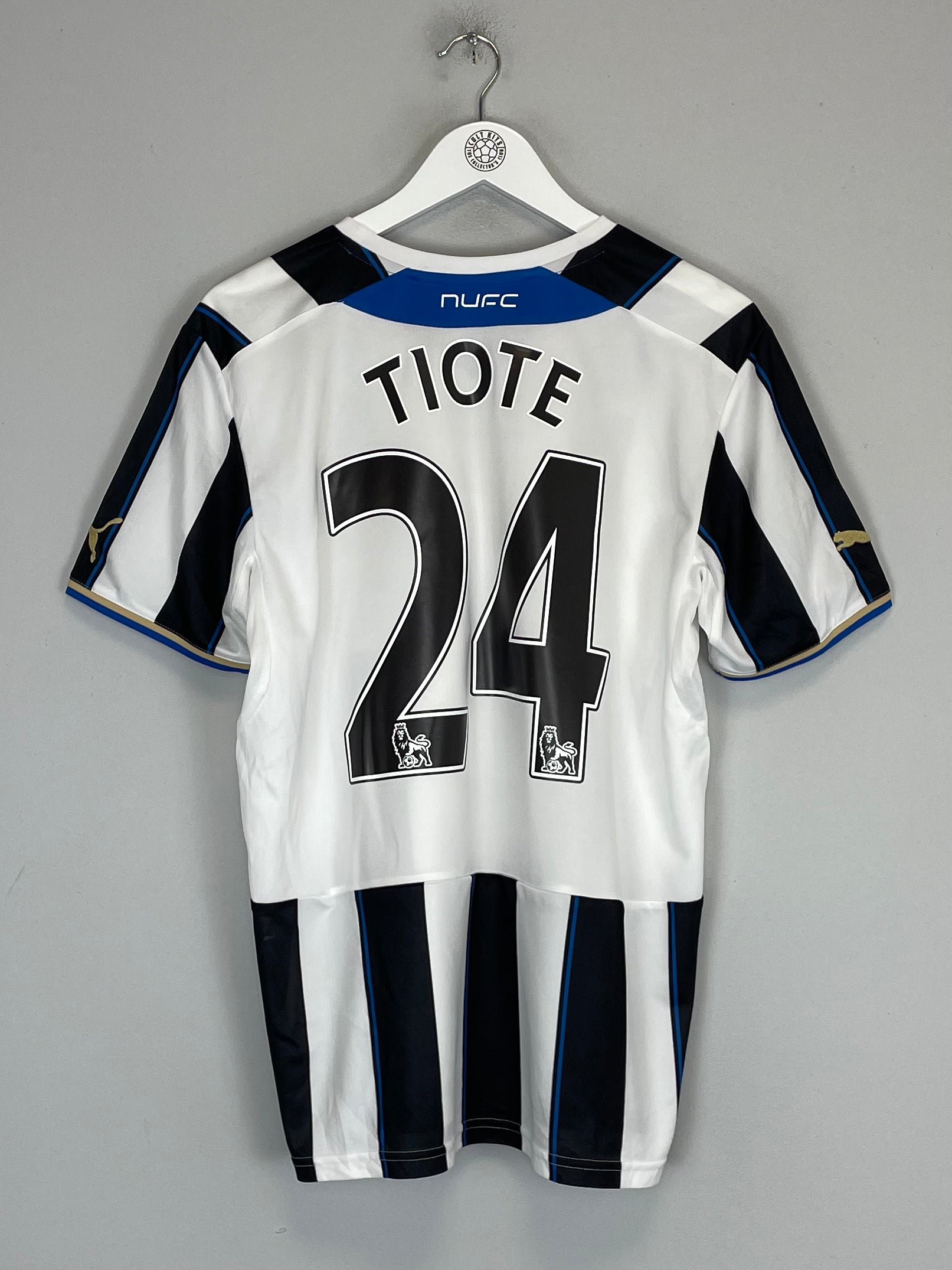 Shop 2013/14 NEWCASTLE TIOTE #24 HOME SHIRT (M) PUMA, classic football shirts, vintage football shirts & retro soccer jerseys at Cult Kits