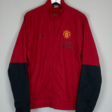 Shop 2009/10 MANCHESTER UNITED TRACK JACKET (XL) NIKE, classic football shirts, vintage football shirts & retro soccer jerseys at Cult Kits