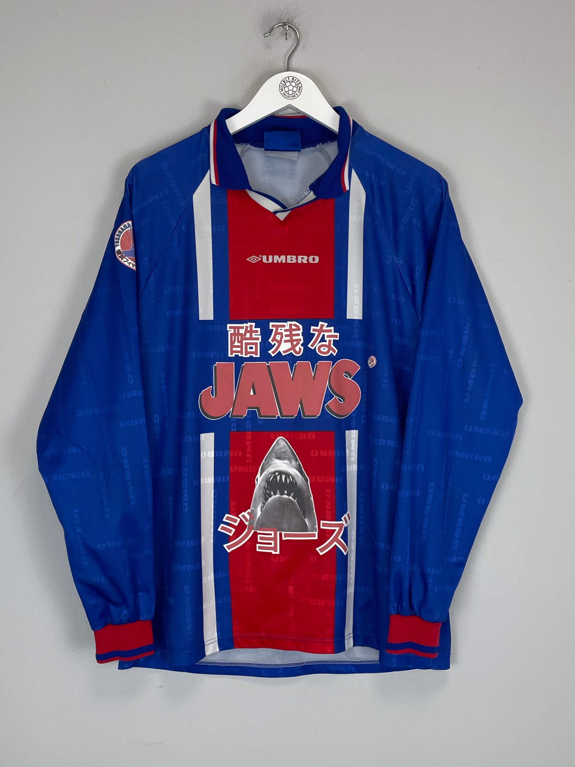 Shop 1997/98 JAWS X JAPANESE MOVIE MASHUP SHIRT (L) UMBRO, classic football shirts, vintage football shirts & retro soccer jerseys at Cult Kits