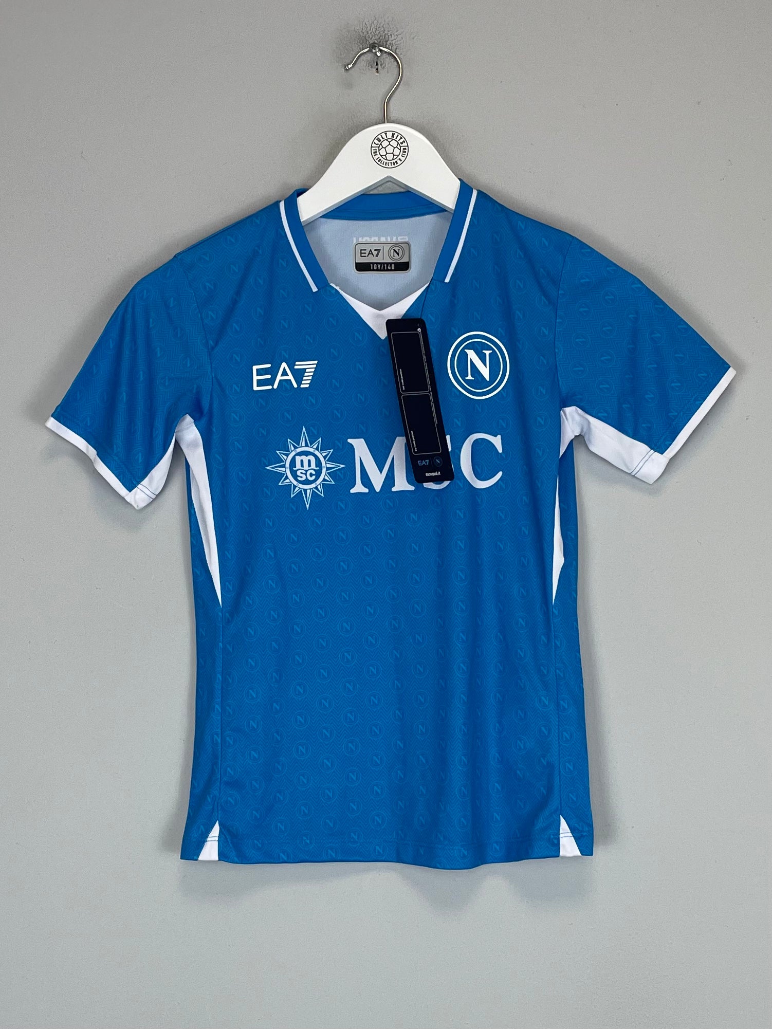 Shop 2024/25 Napoli *BNWT* Stadium Home Shirt (Kids - Multiple Sizes) EA7, classic football shirts, vintage football shirts & retro soccer jerseys at Cult Kits