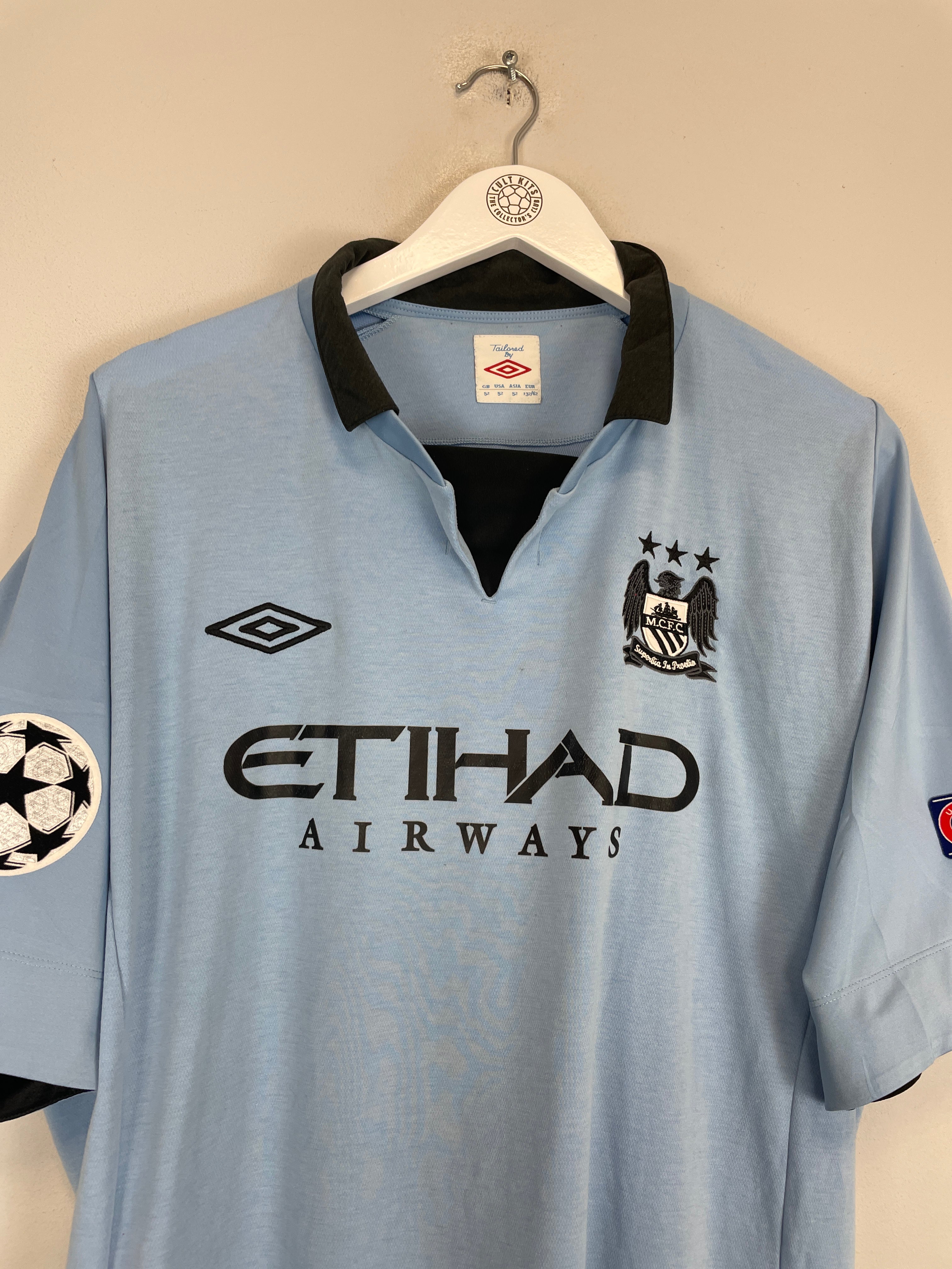 Shop 2012/13 MANCHESTER CITY BALOTELLI #45 C/L HOME SHIRT (XXL) UMBRO, classic football shirts, vintage football shirts & retro soccer jerseys at Cult Kits