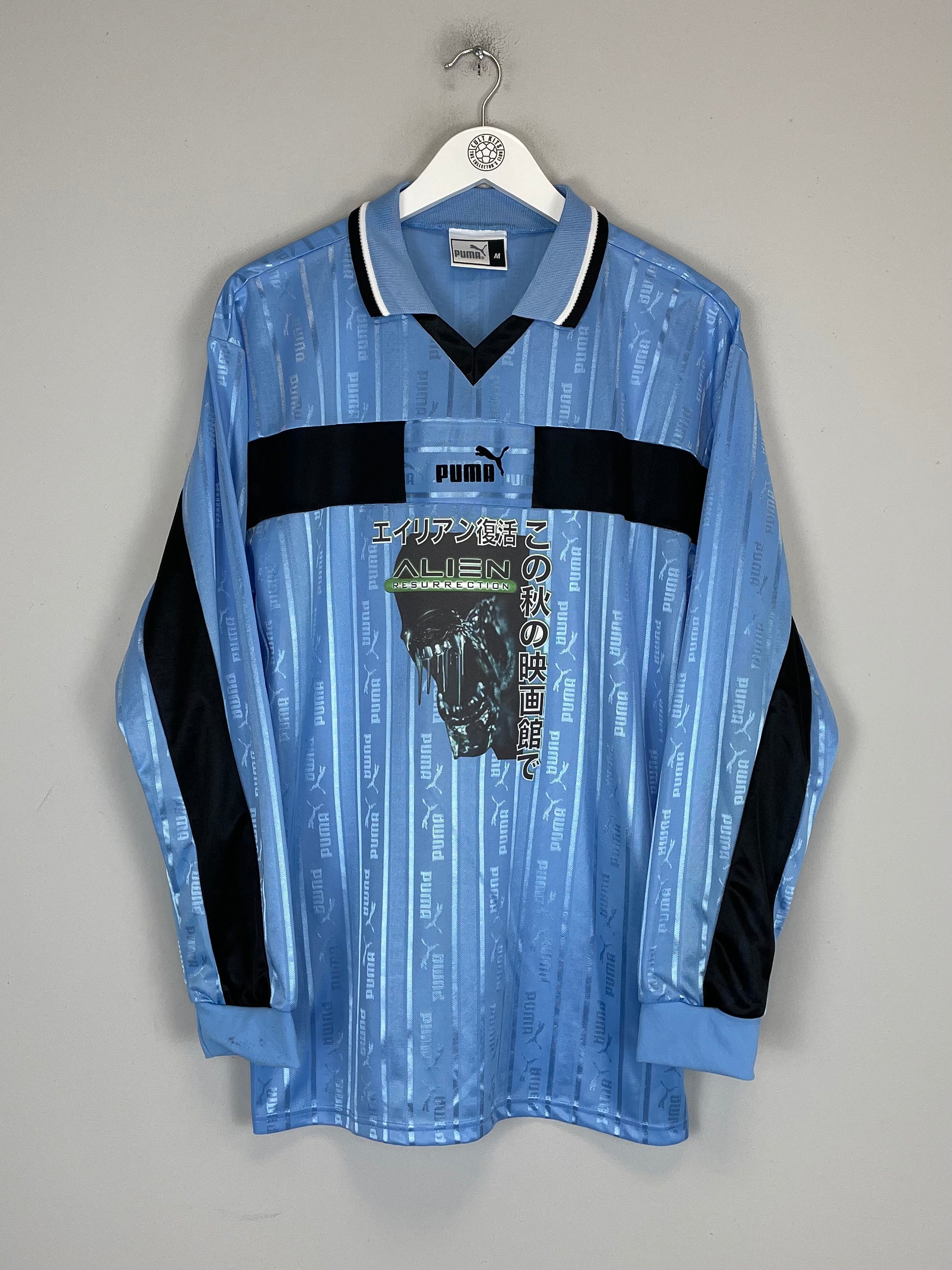 Shop 1999 ALIEN X JAPANSESE MOVIE MASHUP SHIRT (M) PUMA, classic football shirts, vintage football shirts & retro soccer jerseys at Cult Kits