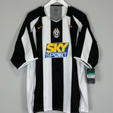 Shop 2004/05 JUVENTUS TREZEGUET #17 *BNWT* HOME SHIRT (XL) NIKE, classic football shirts, vintage football shirts & retro soccer jerseys at Cult Kits