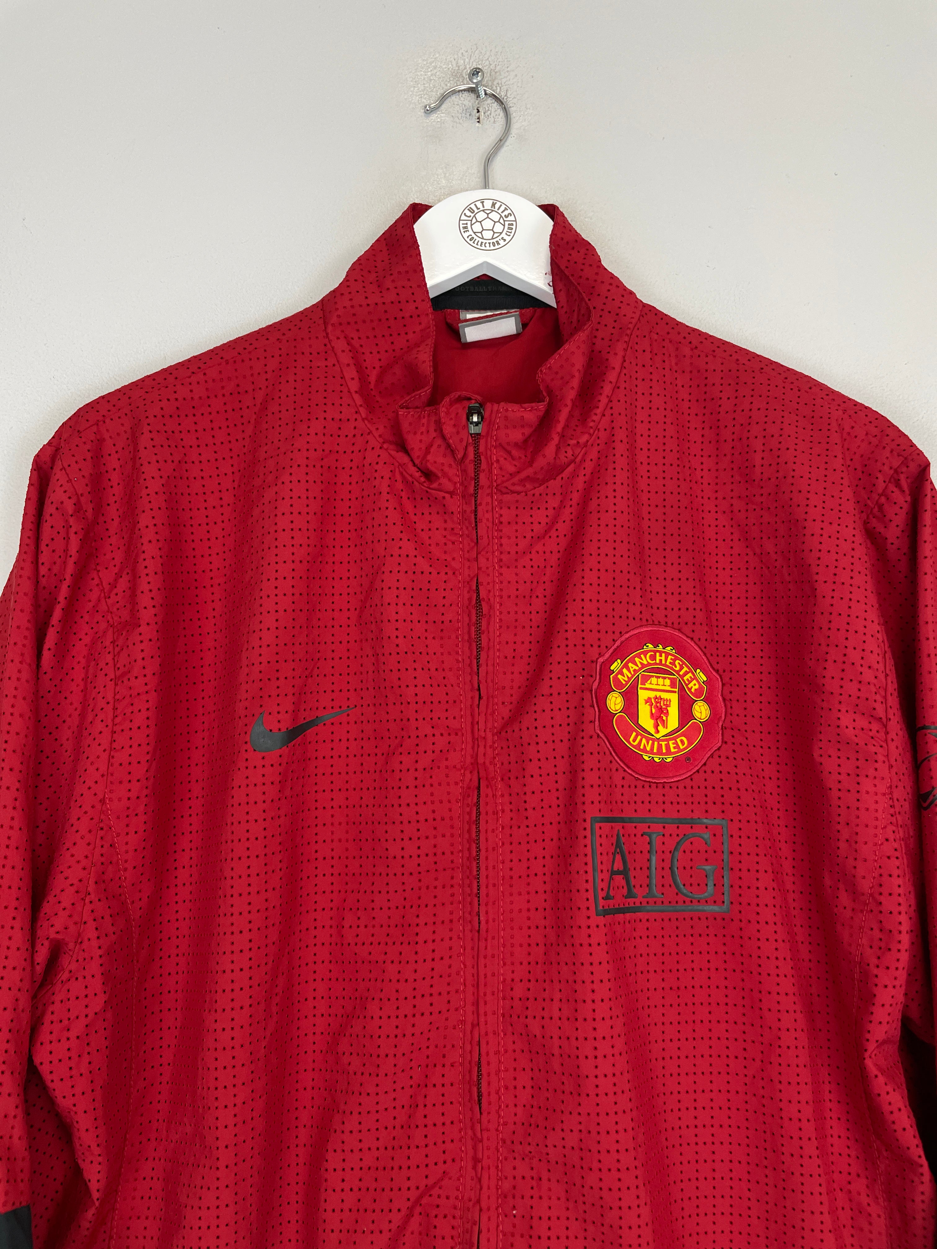 Shop 2009/10 MANCHESTER UNITED TRACK JACKET (XL) NIKE, classic football shirts, vintage football shirts & retro soccer jerseys at Cult Kits