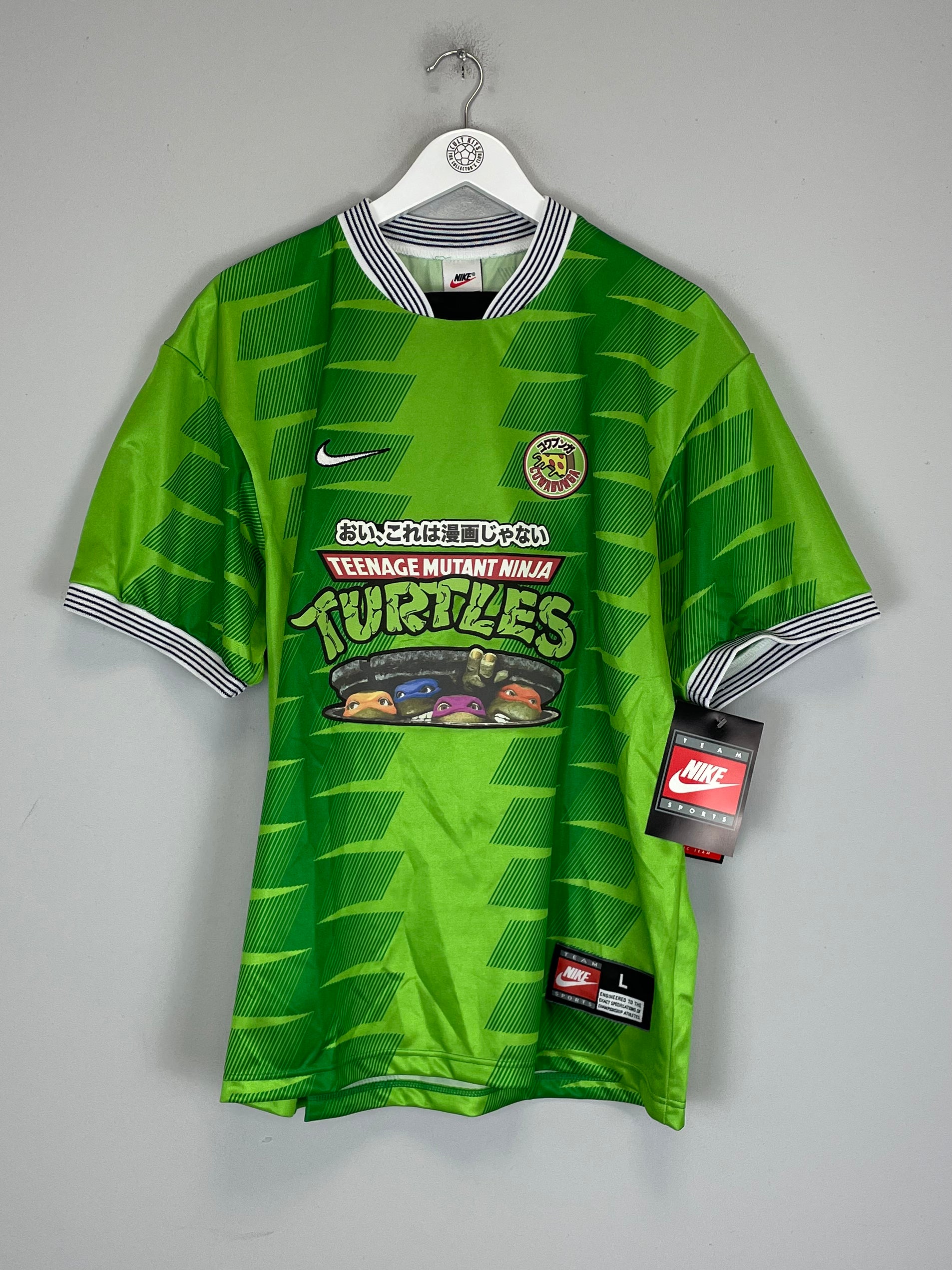 Shop 1998/99 CULT KITS X TURTLES JAPANESE MOVIE MASHUP (L) NIKE, classic football shirts, vintage football shirts & retro soccer jerseys at Cult Kits