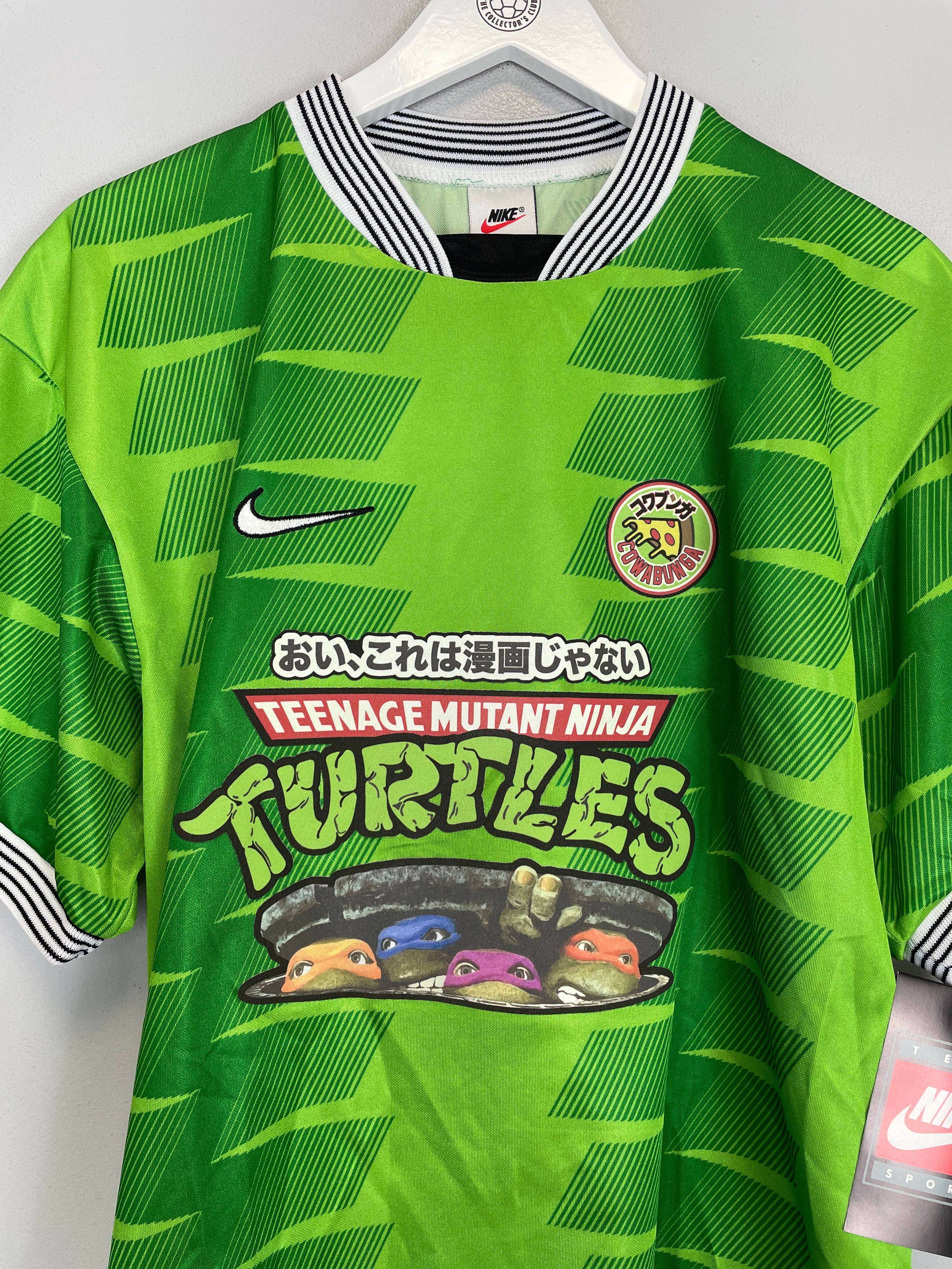Shop 1998/99 CULT KITS X TURTLES JAPANESE MOVIE MASHUP (L) NIKE, classic football shirts, vintage football shirts & retro soccer jerseys at Cult Kits