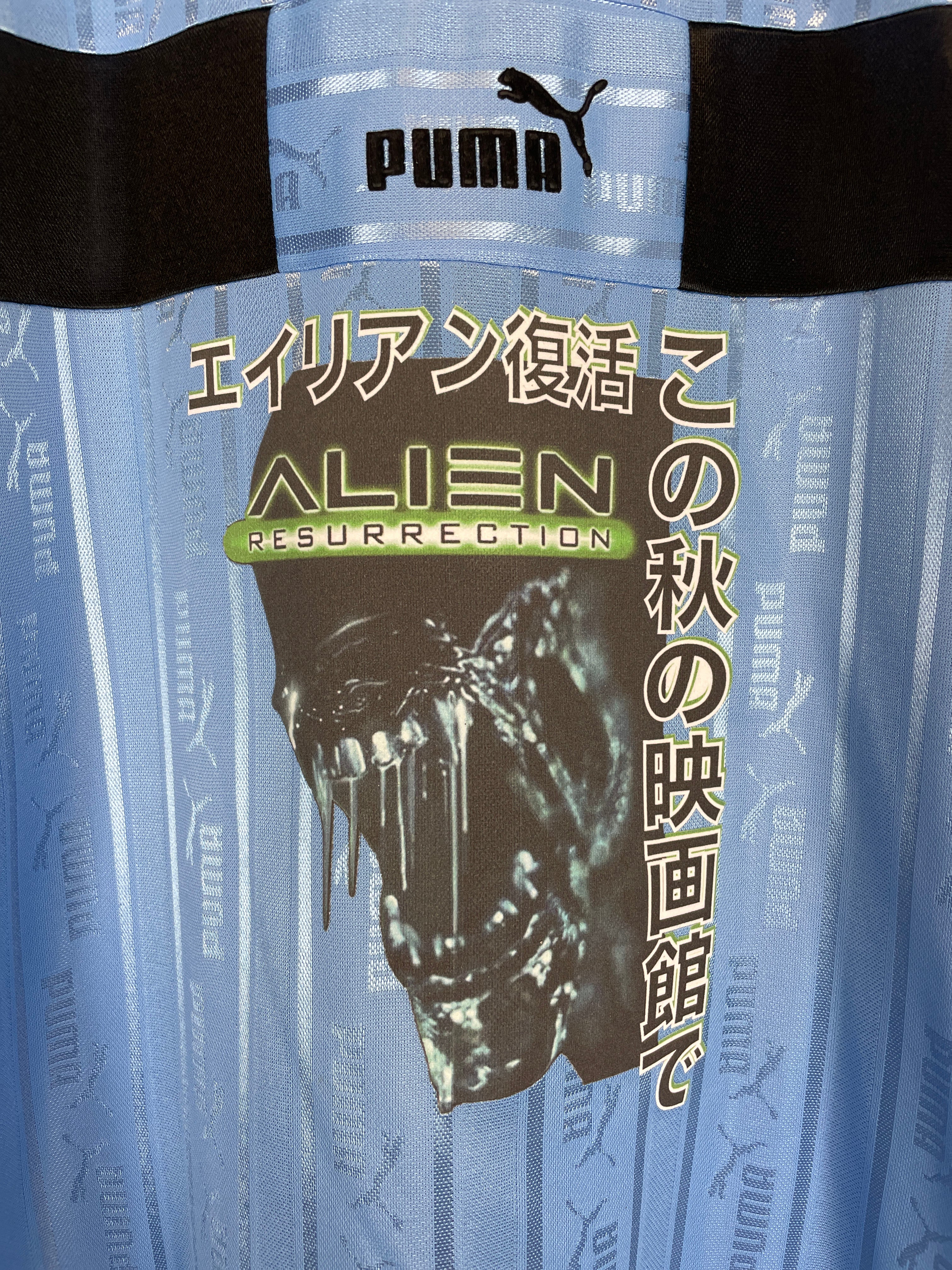 Shop 1999 ALIEN X JAPANSESE MOVIE MASHUP SHIRT (M) PUMA, classic football shirts, vintage football shirts & retro soccer jerseys at Cult Kits