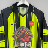 Shop 1997/98 JURASSIC PARK X JAPANESE MOVIE MASHUP *BNWT* L/S SHIRT (M) NIKE, classic football shirts, vintage football shirts & retro soccer jerseys at Cult Kits