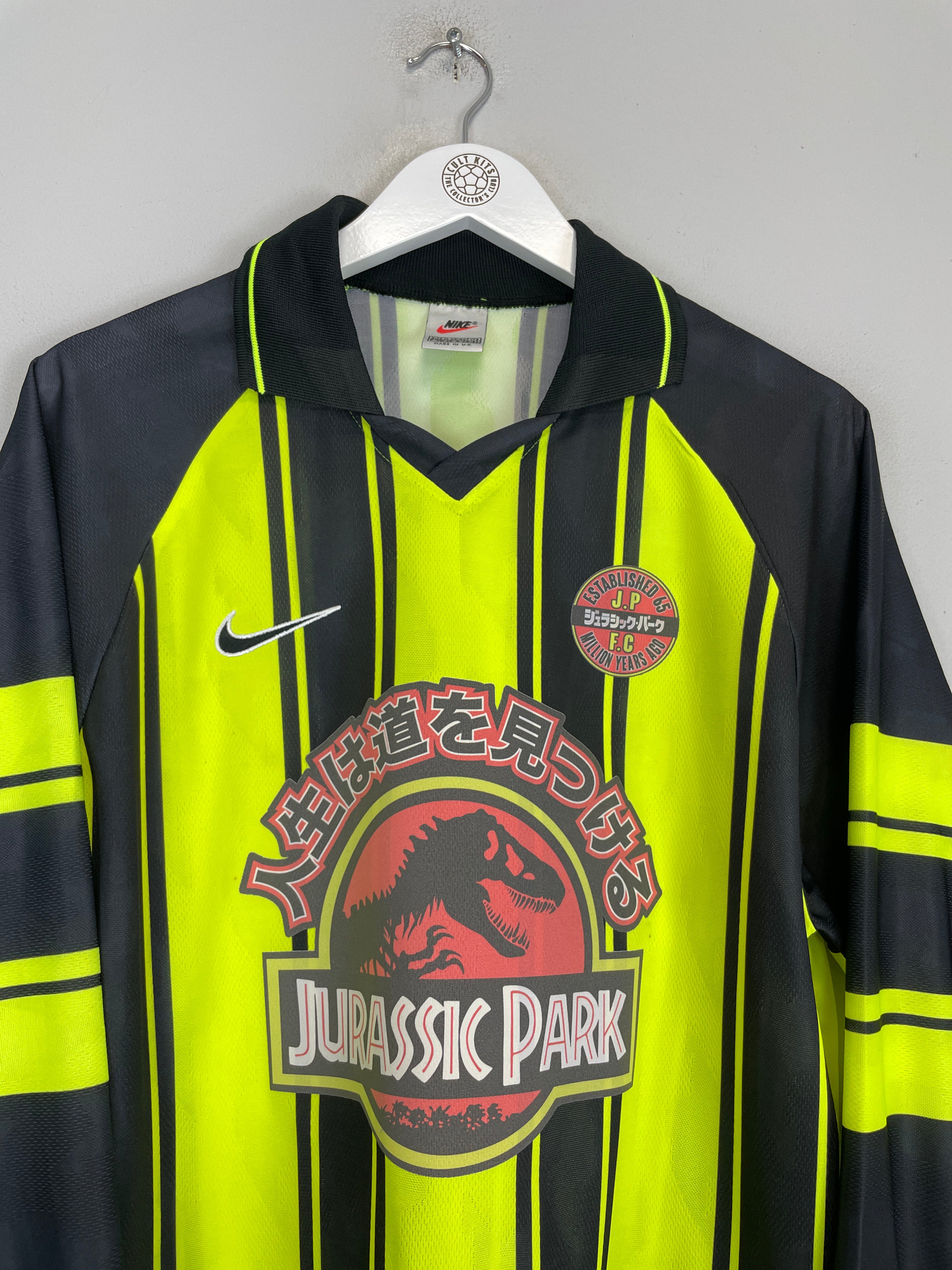 Shop 1997/98 JURASSIC PARK X JAPANESE MOVIE MASHUP *BNWT* L/S SHIRT (M) NIKE, classic football shirts, vintage football shirts & retro soccer jerseys at Cult Kits
