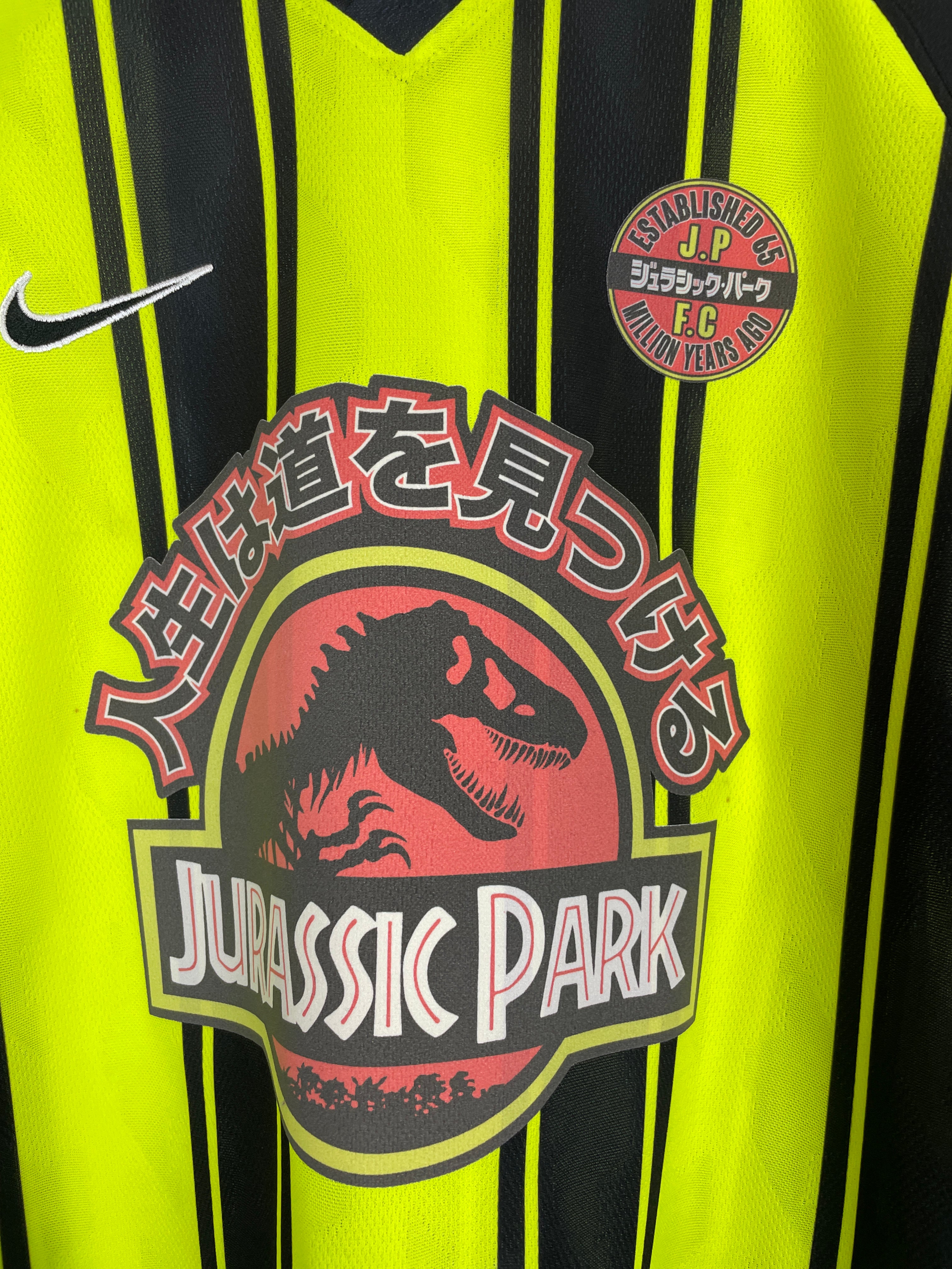 Shop 1997/98 JURASSIC PARK X JAPANESE MOVIE MASHUP *BNWT* L/S SHIRT (M) NIKE, classic football shirts, vintage football shirts & retro soccer jerseys at Cult Kits