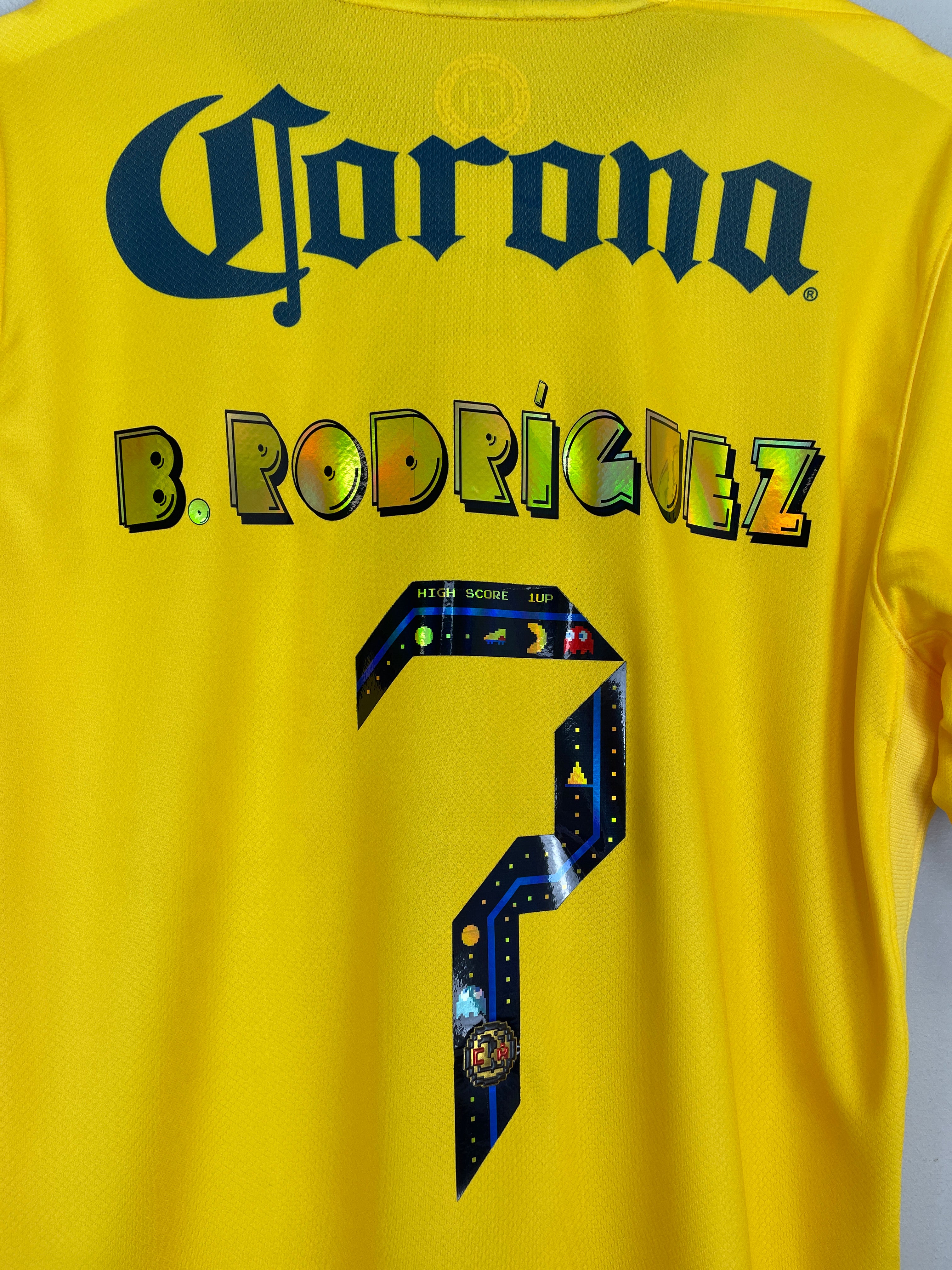 Shop 2024/25 Club America Rodriguez #7 *BNWOT* Pac-Man Home Shirt (Multiple Sizes) Nike, classic football shirts, vintage football shirts & retro soccer jerseys at Cult Kits