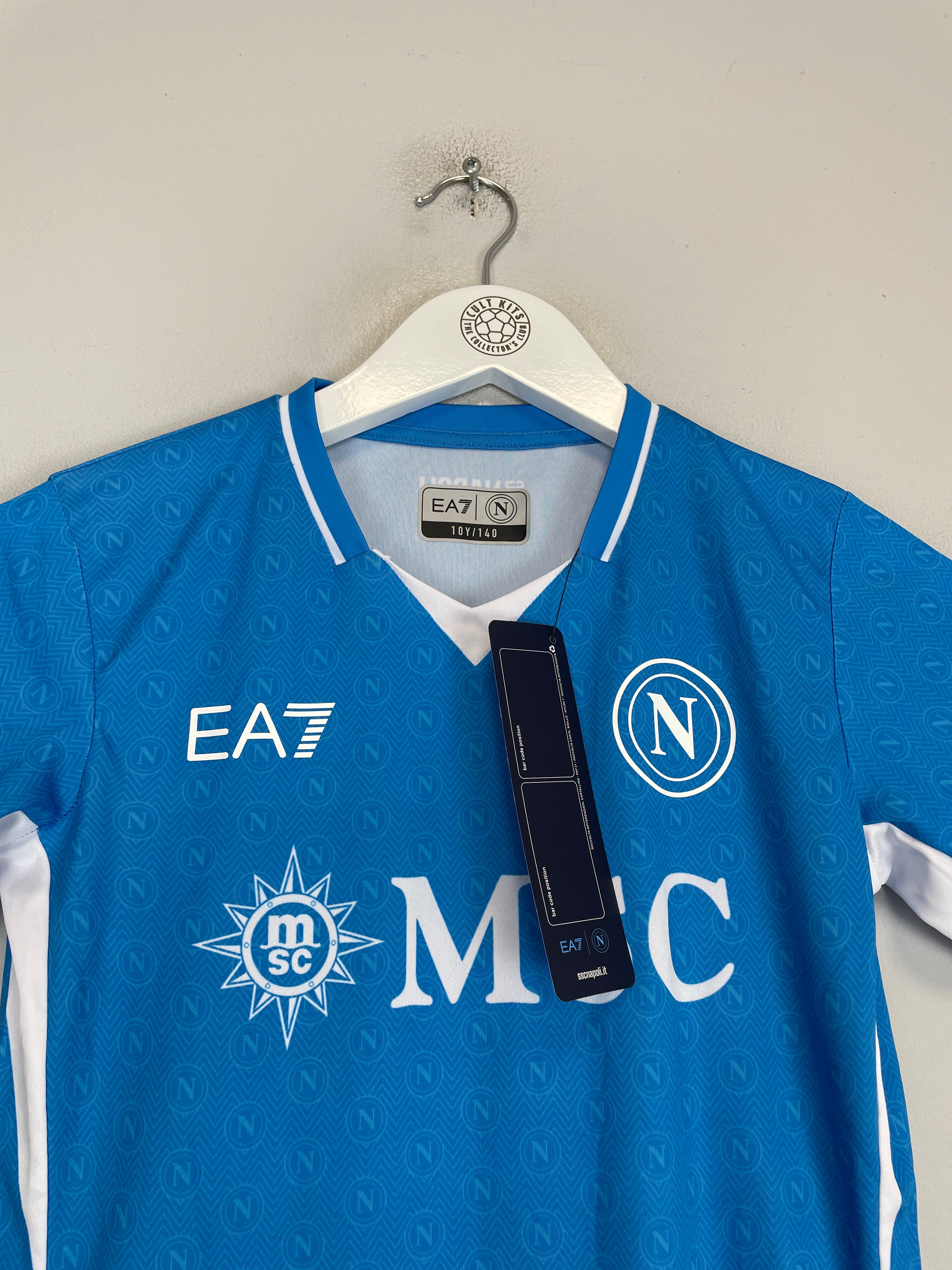 Shop 2024/25 Napoli *BNWT* Stadium Home Shirt (Kids - Multiple Sizes) EA7, classic football shirts, vintage football shirts & retro soccer jerseys at Cult Kits