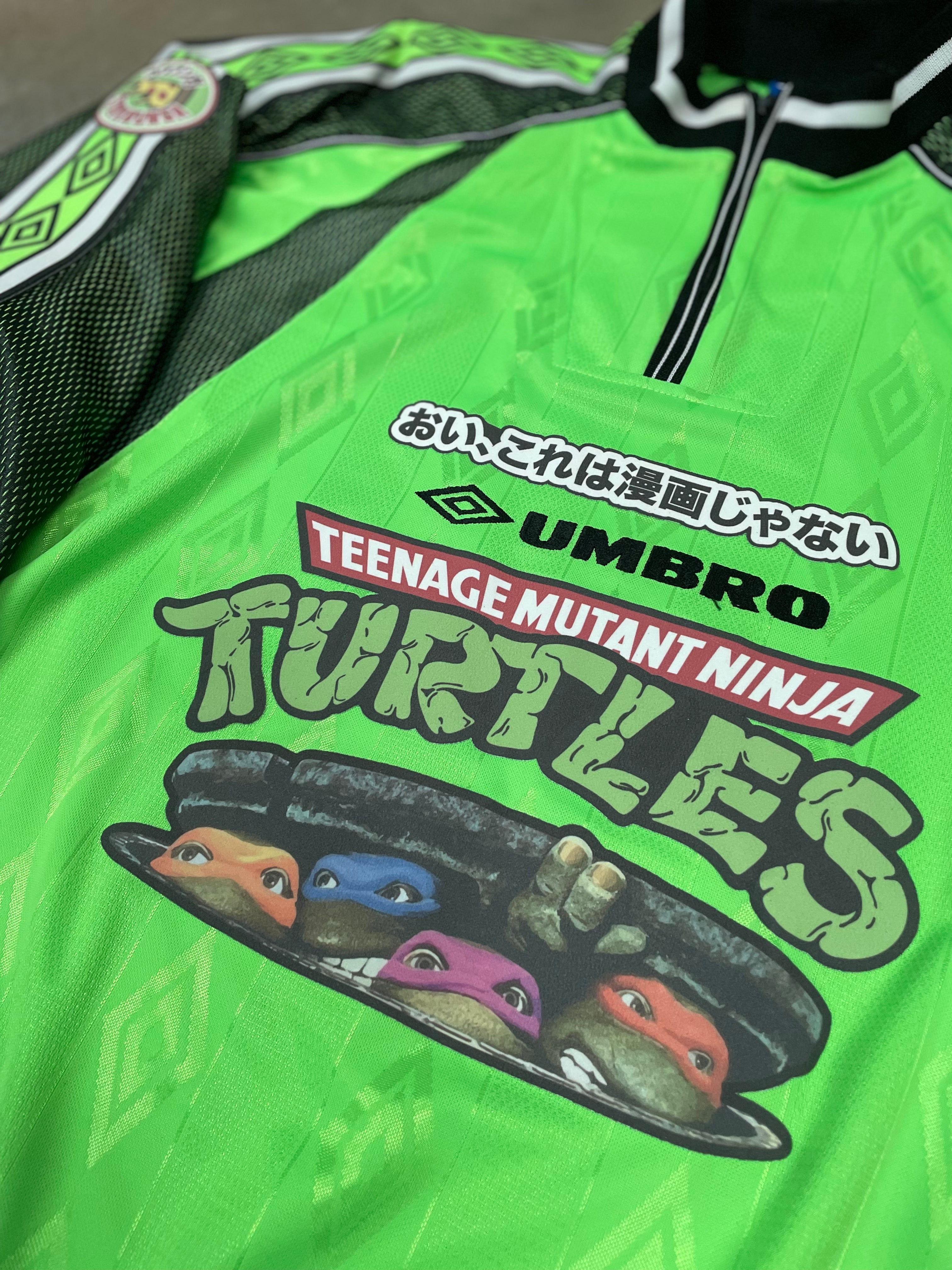 Shop 1998/99 NINJA TURTLES X JAPANESE MOVIE MASHUP SHIRT (XL) UMBRO, classic football shirts, vintage football shirts & retro soccer jerseys at Cult Kits