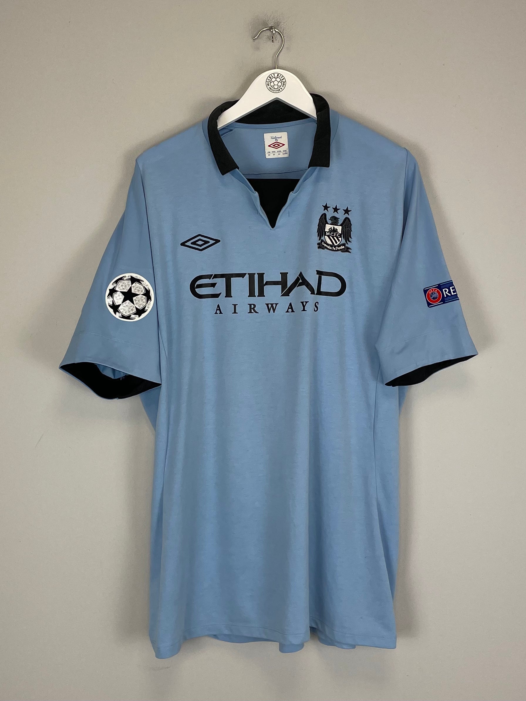 Shop 2012/13 MANCHESTER CITY BALOTELLI #45 C/L HOME SHIRT (XXL) UMBRO, classic football shirts, vintage football shirts & retro soccer jerseys at Cult Kits
