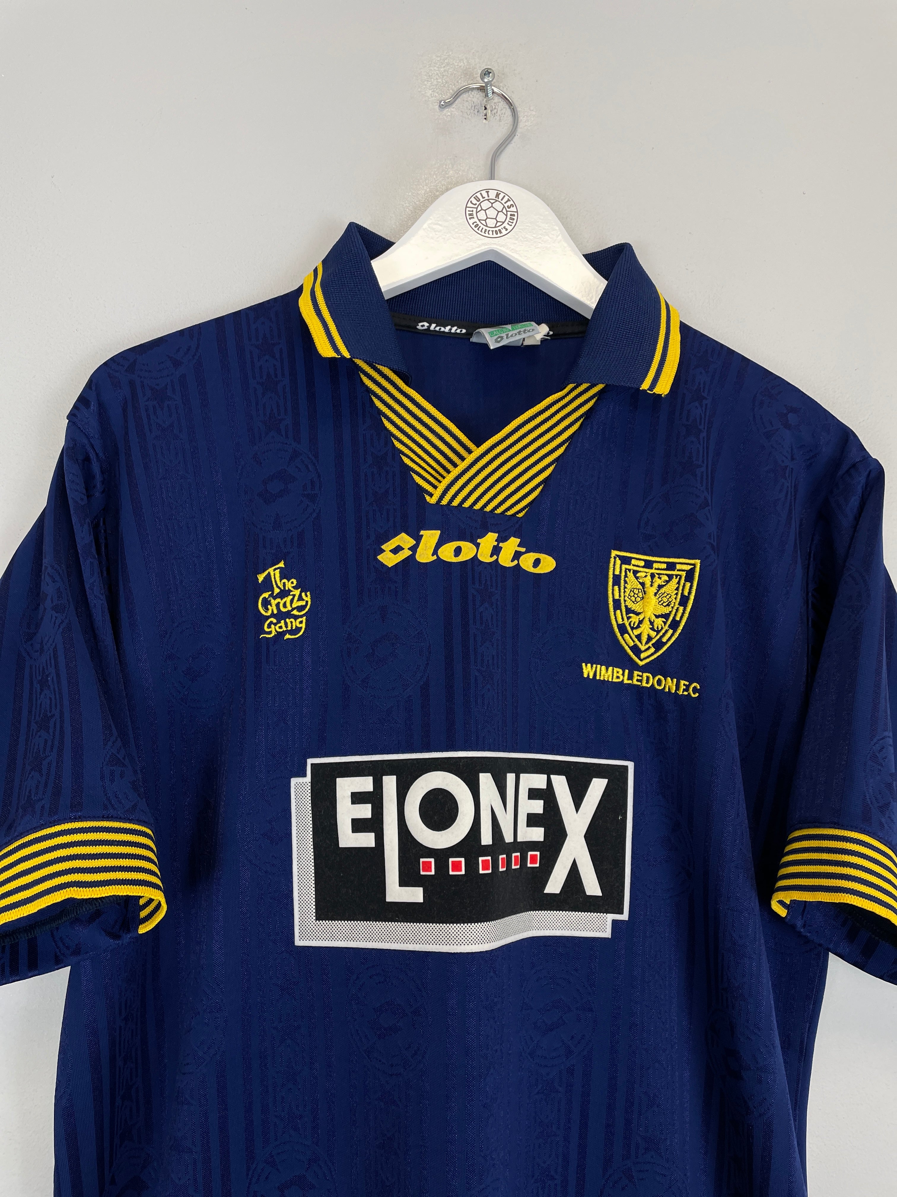 Shop 1997/99 WIMBLEDON EKOKU #9 HOME SHIRT (M) LOTTO, classic football shirts, vintage football shirts & retro soccer jerseys at Cult Kits