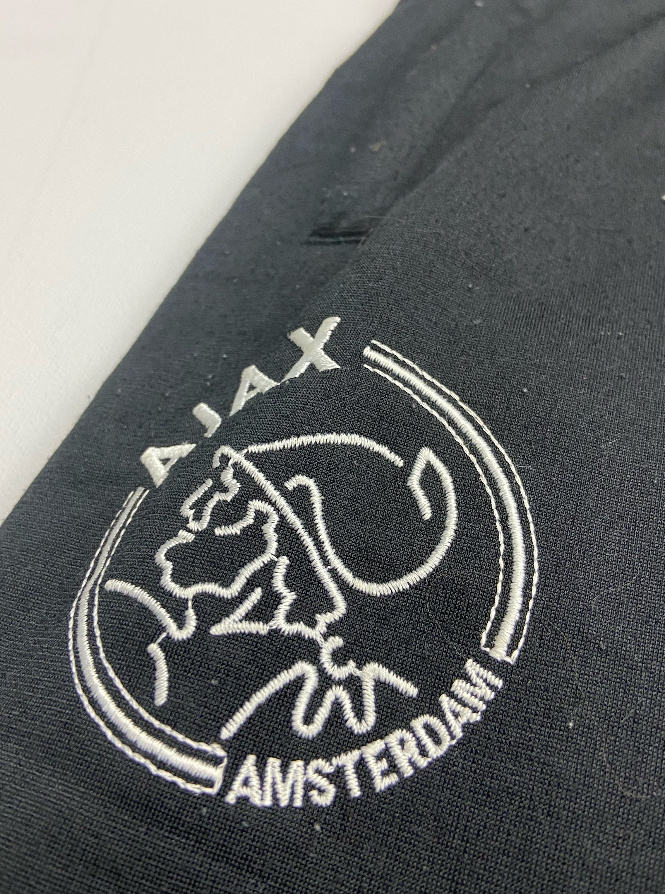 Shop 1999/00 AJAX TRACKSUIT BOTTOMS (S) UMBRO, classic football shirts, vintage football shirts & retro soccer jerseys at Cult Kits