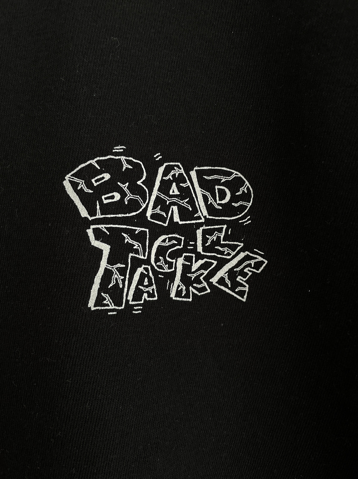 BAD TACKLE TEE
