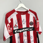 Shop 2007/08 SHEFFIELD UNITED HENDRIE #11 *MATCH WORN + SQUAD SIGNED* HOME SHIRT (M) LE COQ SPORTIF, classic football shirts, vintage football shirts & retro soccer jerseys at Cult Kits