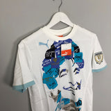 Shop 2010 Puma King Maradona Graphic Tee (Kids Sizes), classic football shirts, vintage football shirts & retro soccer jerseys at Cult Kits