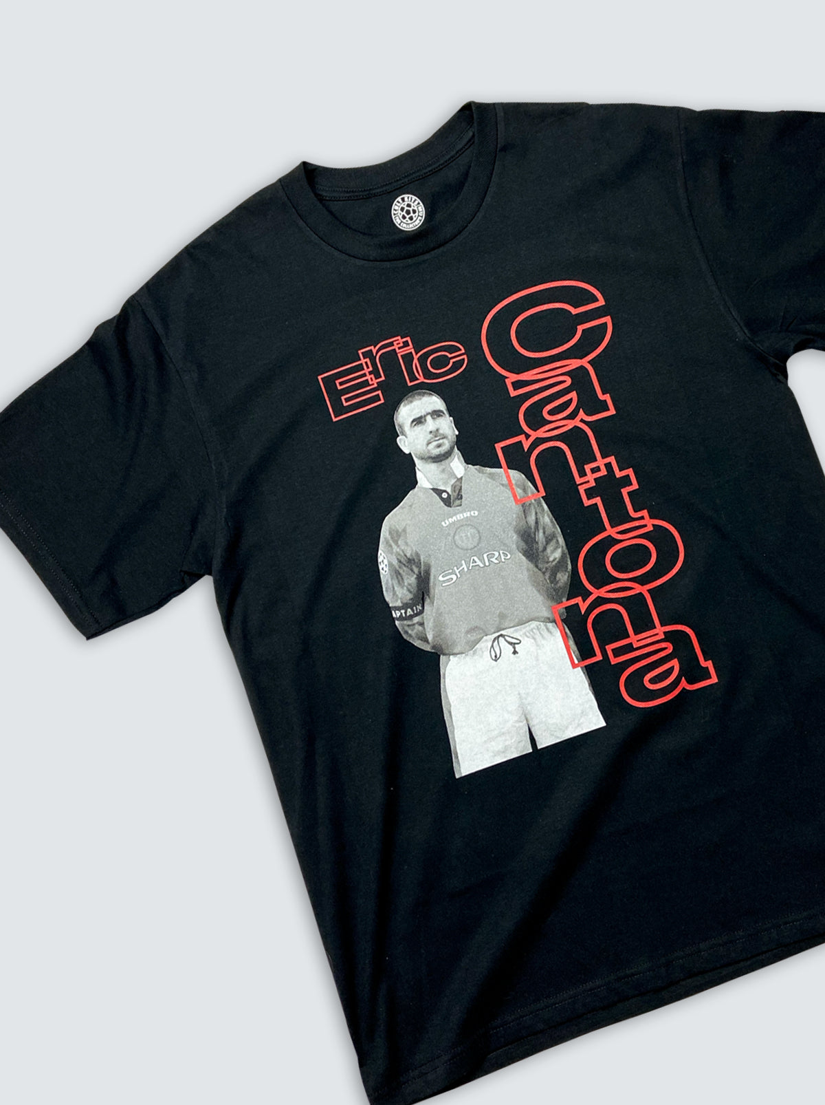 Shop 90s STYLE MANCHESTER UNITED CANTONA BOOTLEG TEE, classic football shirts, vintage football shirts & retro soccer jerseys at Cult Kits