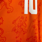 Shop 1994 NETHERLANDS BERGKAMP #10 HOME SHIRT (L) LOTTO, classic football shirts, vintage football shirts & retro soccer jerseys at Cult Kits