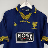Shop 1997/99 WIMBLEDON EKOKU #9 HOME SHIRT (M) LOTTO, classic football shirts, vintage football shirts & retro soccer jerseys at Cult Kits