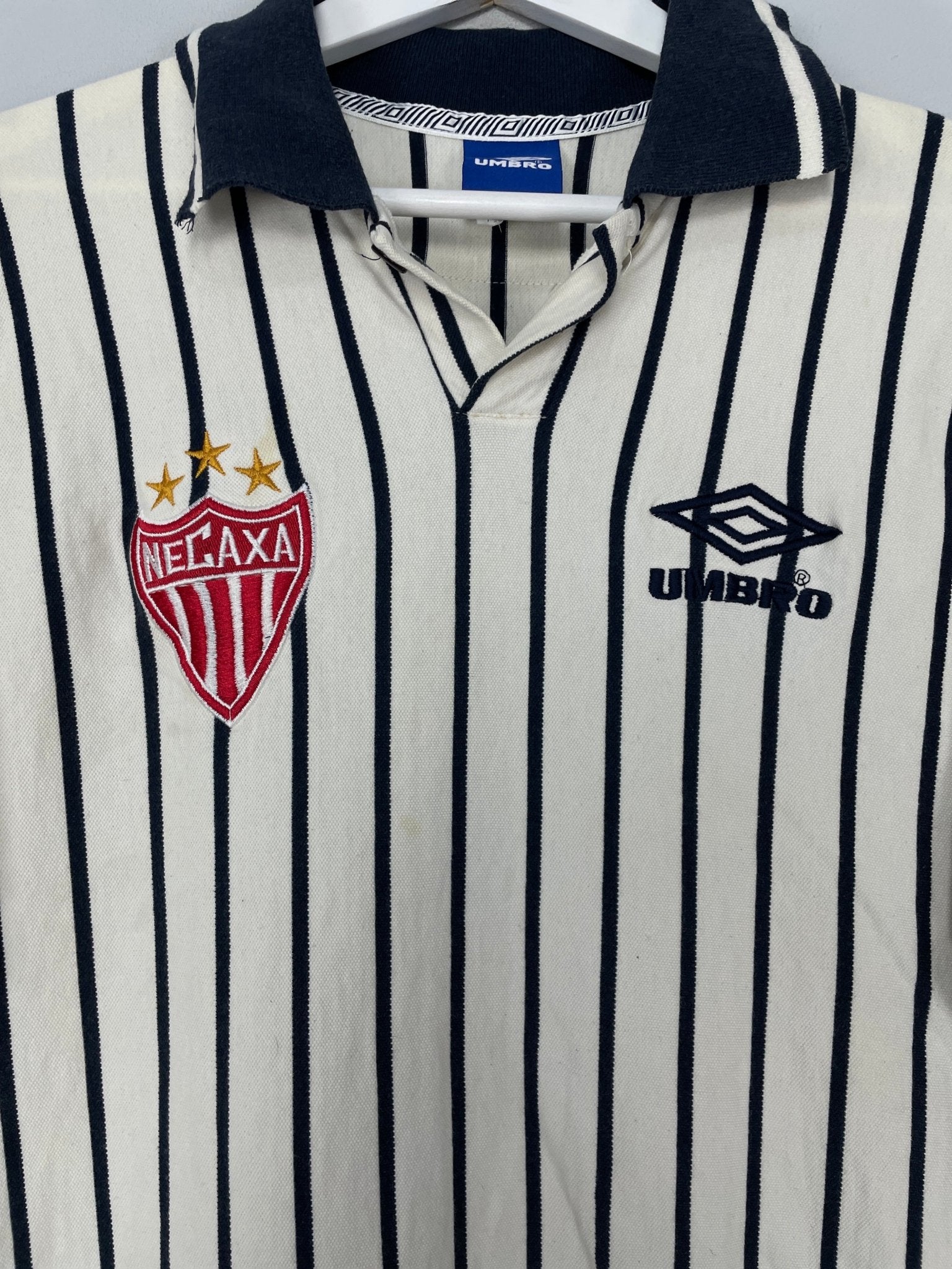 Shop 1998/99 NECAXA POLO SHIRT (L) UMBRO, classic football shirts, vintage football shirts & retro soccer jerseys at Cult Kits