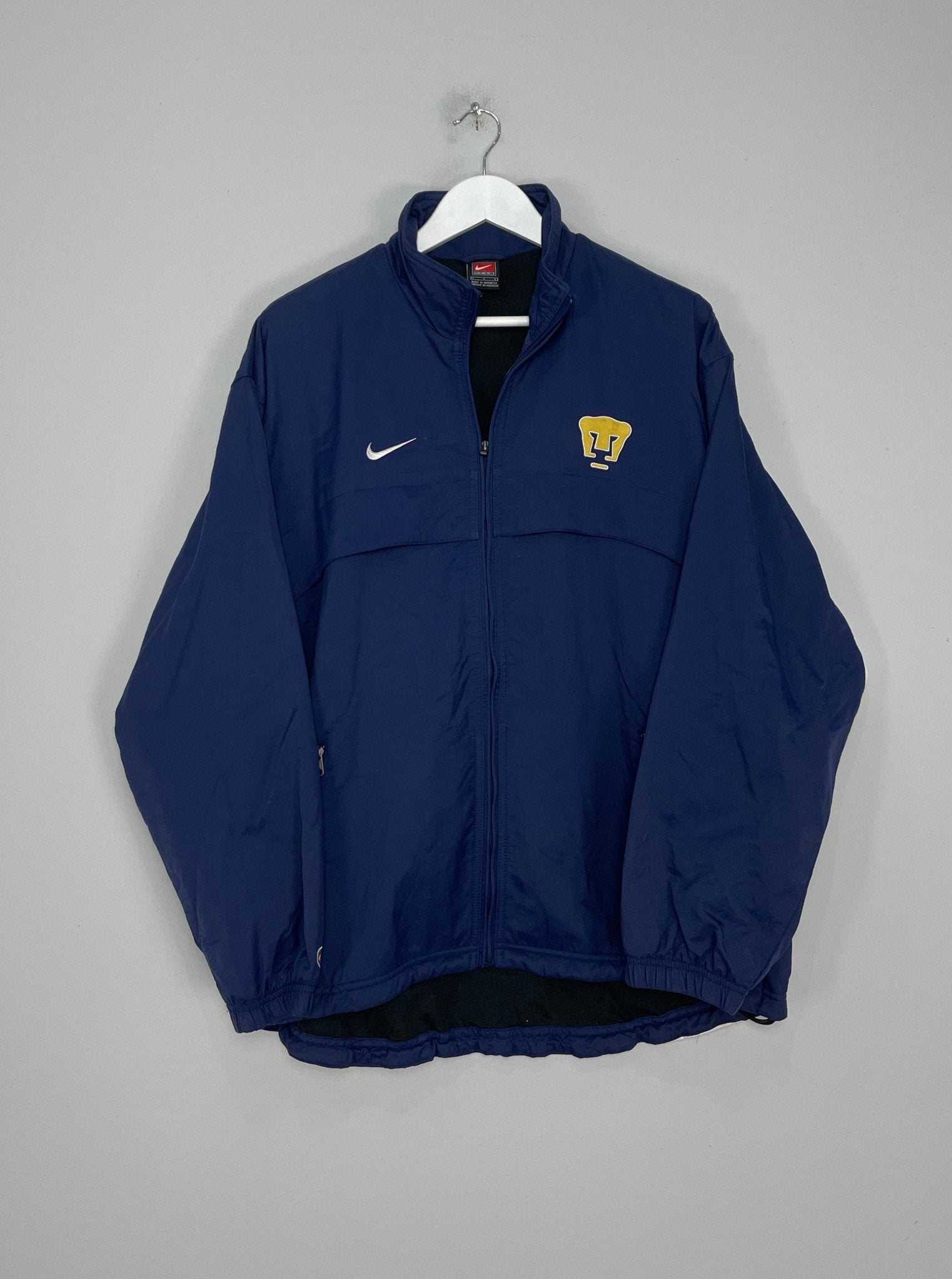 Shop 2001/02 UNAM PUMAS TRACK JACKET (L) NIKE, classic football shirts, vintage football shirts & retro soccer jerseys at Cult Kits