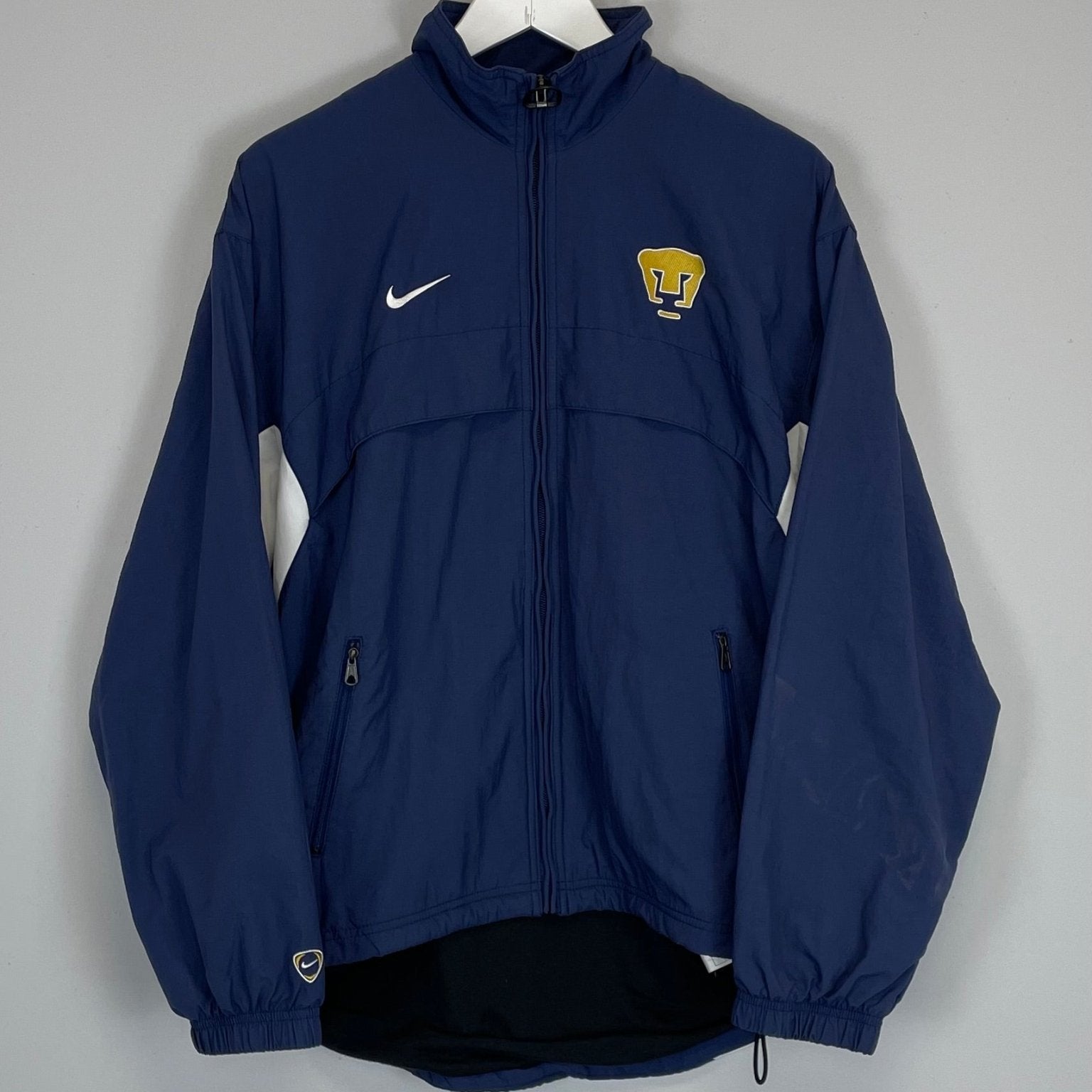 Shop 2001/02 UNAM PUMAS TRACK JACKET (S) NIKE, classic football shirts, vintage football shirts & retro soccer jerseys at Cult Kits