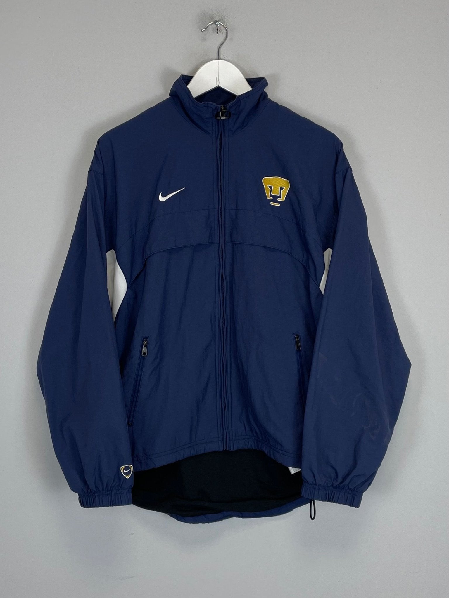 Shop 2001/02 UNAM PUMAS TRACK JACKET (S) NIKE, classic football shirts, vintage football shirts & retro soccer jerseys at Cult Kits
