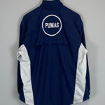Shop 2001/02 UNAM PUMAS TRACK JACKET (S) NIKE, classic football shirts, vintage football shirts & retro soccer jerseys at Cult Kits