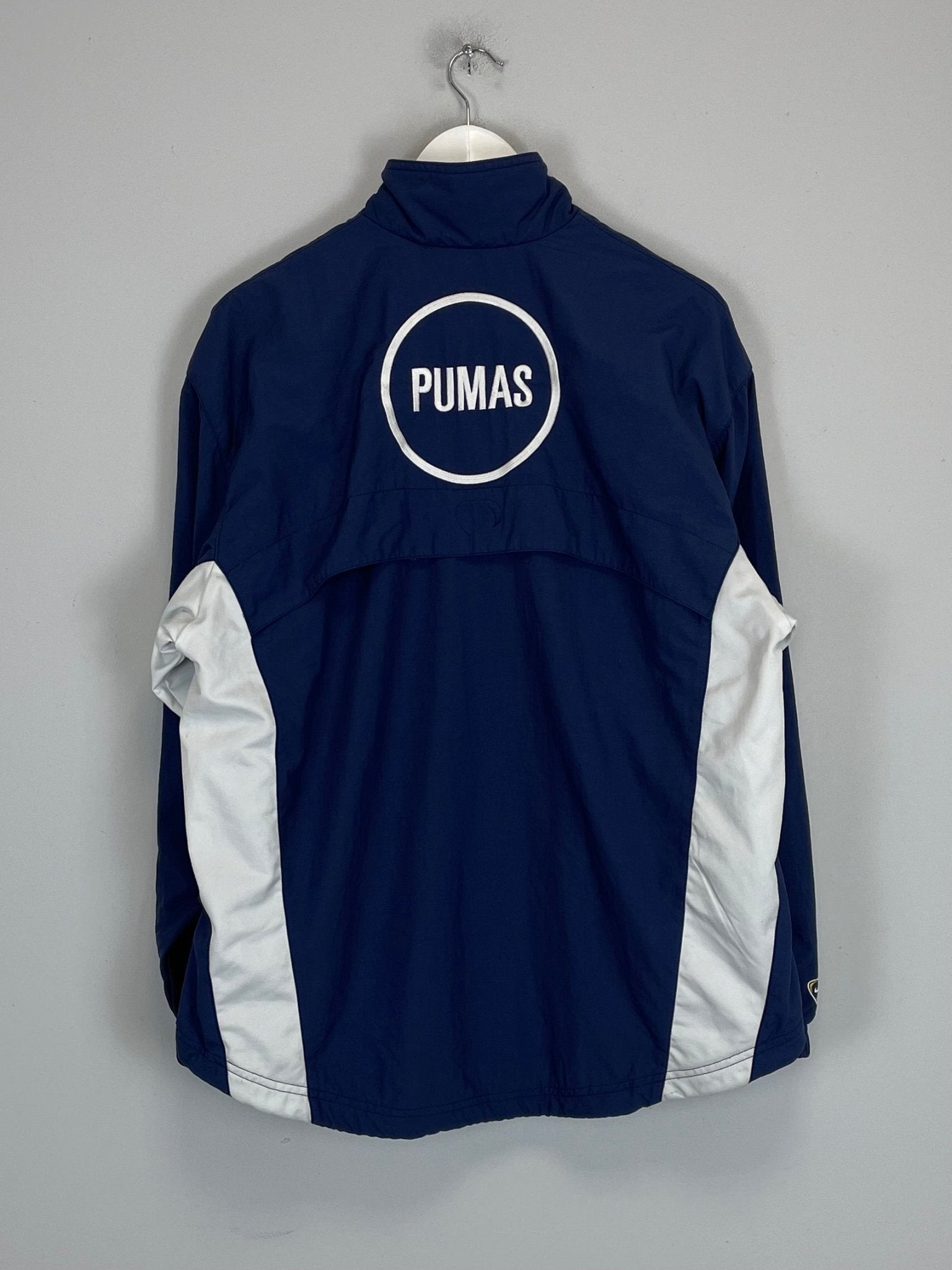 Shop 2001/02 UNAM PUMAS TRACK JACKET (S) NIKE, classic football shirts, vintage football shirts & retro soccer jerseys at Cult Kits