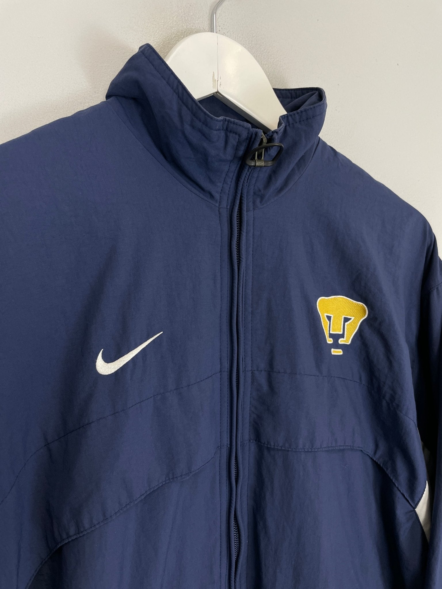 Shop 2001/02 UNAM PUMAS TRACK JACKET (S) NIKE, classic football shirts, vintage football shirts & retro soccer jerseys at Cult Kits