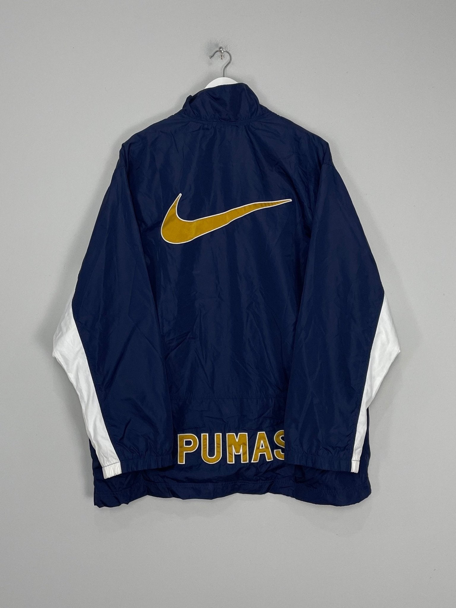 Shop 2001/02 UNAM PUMAS TRAINING JACKET (M) NIKE, classic football shirts, vintage football shirts & retro soccer jerseys at Cult Kits