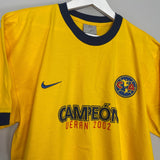 Shop 2002/03 CLUB AMERICA 'CHAMPIONS' T-SHIRT (M) NIKE, classic football shirts, vintage football shirts & retro soccer jerseys at Cult Kits