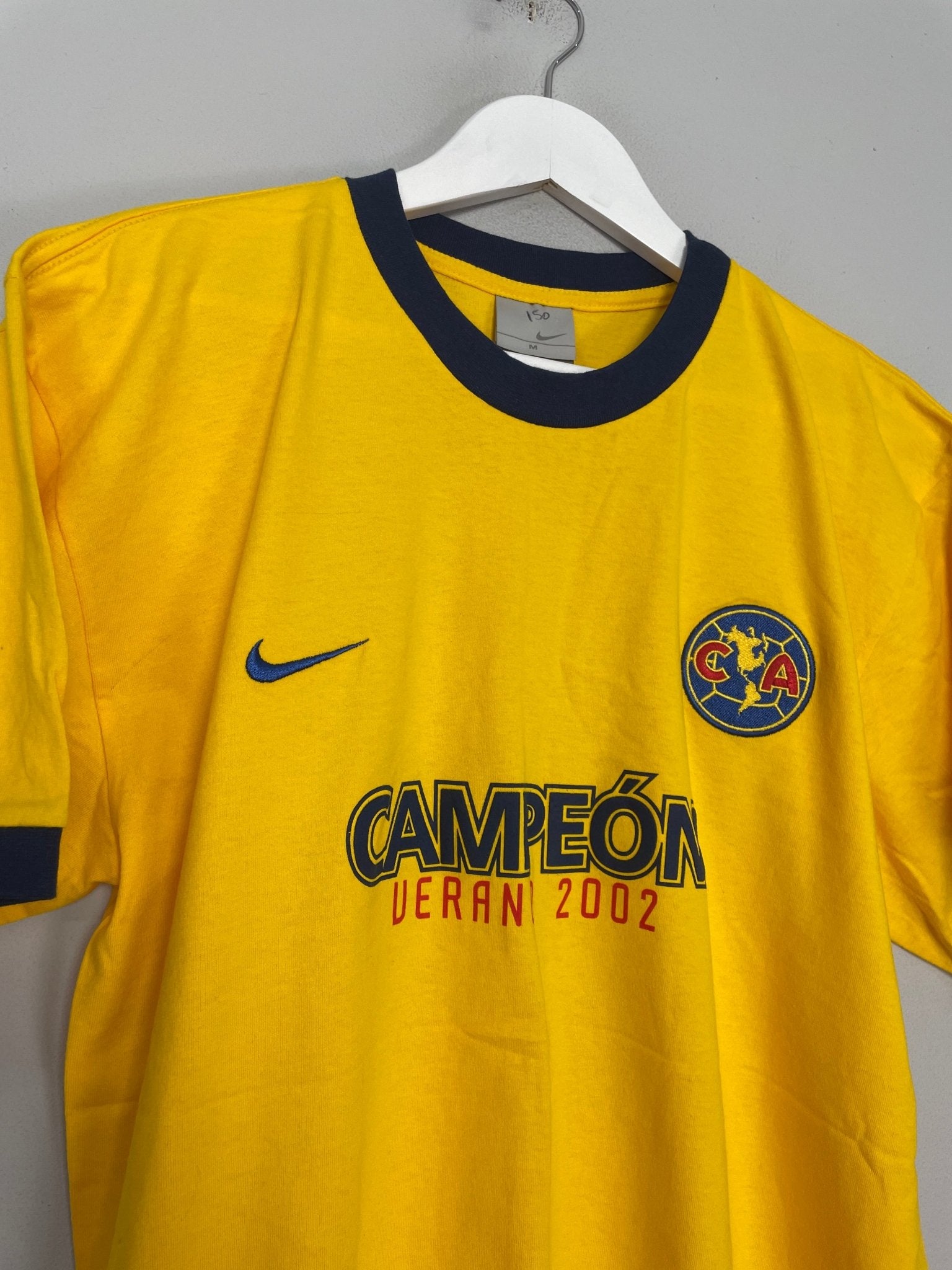 Shop 2002/03 CLUB AMERICA 'CHAMPIONS' T-SHIRT (M) NIKE, classic football shirts, vintage football shirts & retro soccer jerseys at Cult Kits
