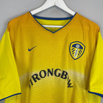 Shop 2002/03 LEEDS UNITED RADEBE #5 AWAY SHIRT (XL) NIKE, classic football shirts, vintage football shirts & retro soccer jerseys at Cult Kits