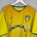 Shop 2002/03 LEEDS UNITED RADEBE #5 AWAY SHIRT (XL) NIKE, classic football shirts, vintage football shirts & retro soccer jerseys at Cult Kits