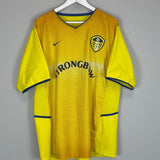 Shop 2002/03 LEEDS UNITED RADEBE #5 AWAY SHIRT (XL) NIKE, classic football shirts, vintage football shirts & retro soccer jerseys at Cult Kits