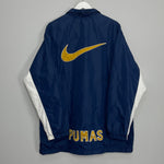 Shop 2002/03 UNAM PUMAS TRACK JACKET (L) NIKE, classic football shirts, vintage football shirts & retro soccer jerseys at Cult Kits