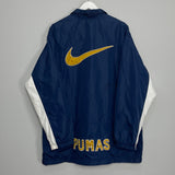 Shop 2002/03 UNAM PUMAS TRACK JACKET (L) NIKE, classic football shirts, vintage football shirts & retro soccer jerseys at Cult Kits