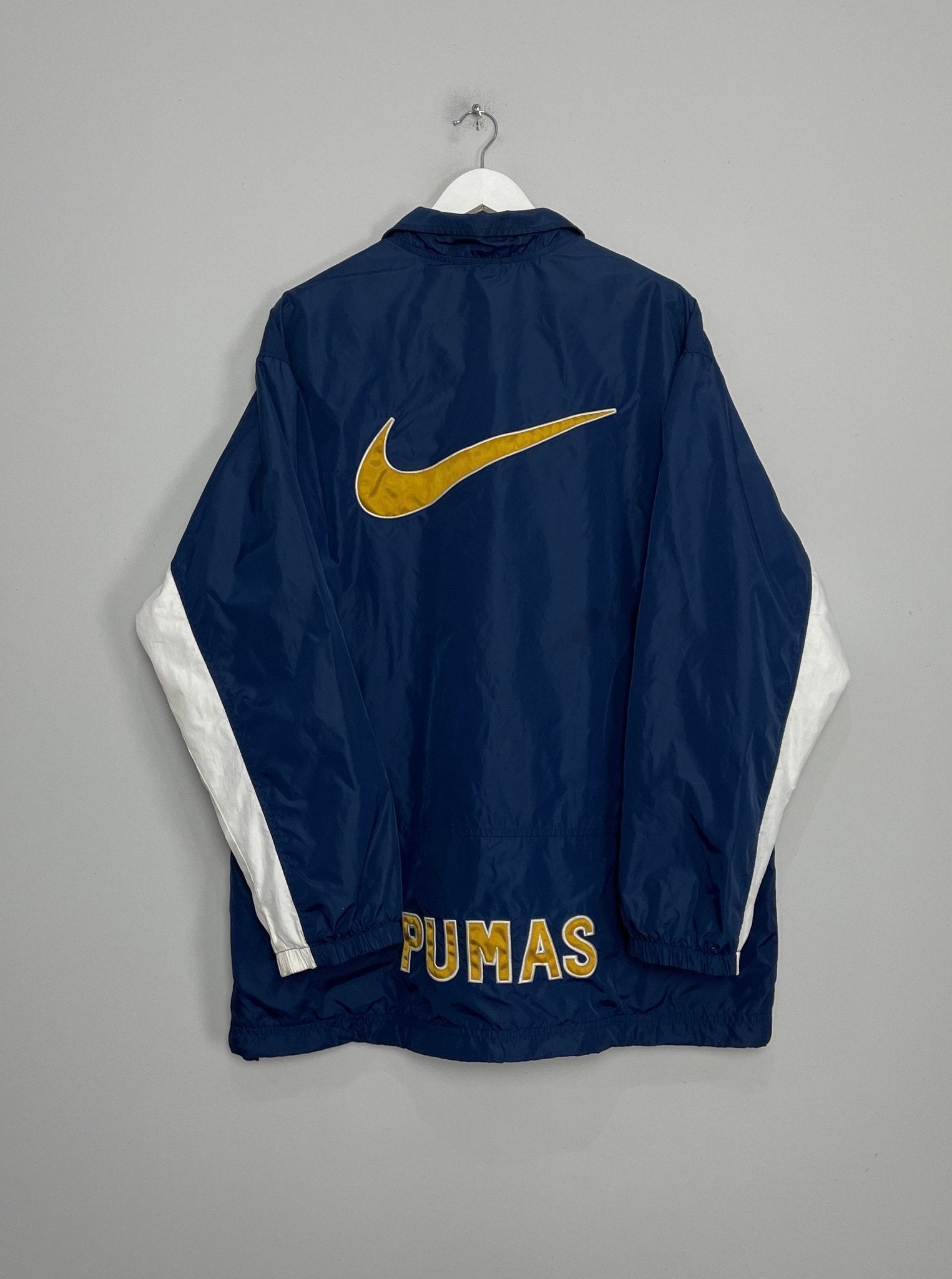 Shop 2002/03 UNAM PUMAS TRACK JACKET (L) NIKE, classic football shirts, vintage football shirts & retro soccer jerseys at Cult Kits