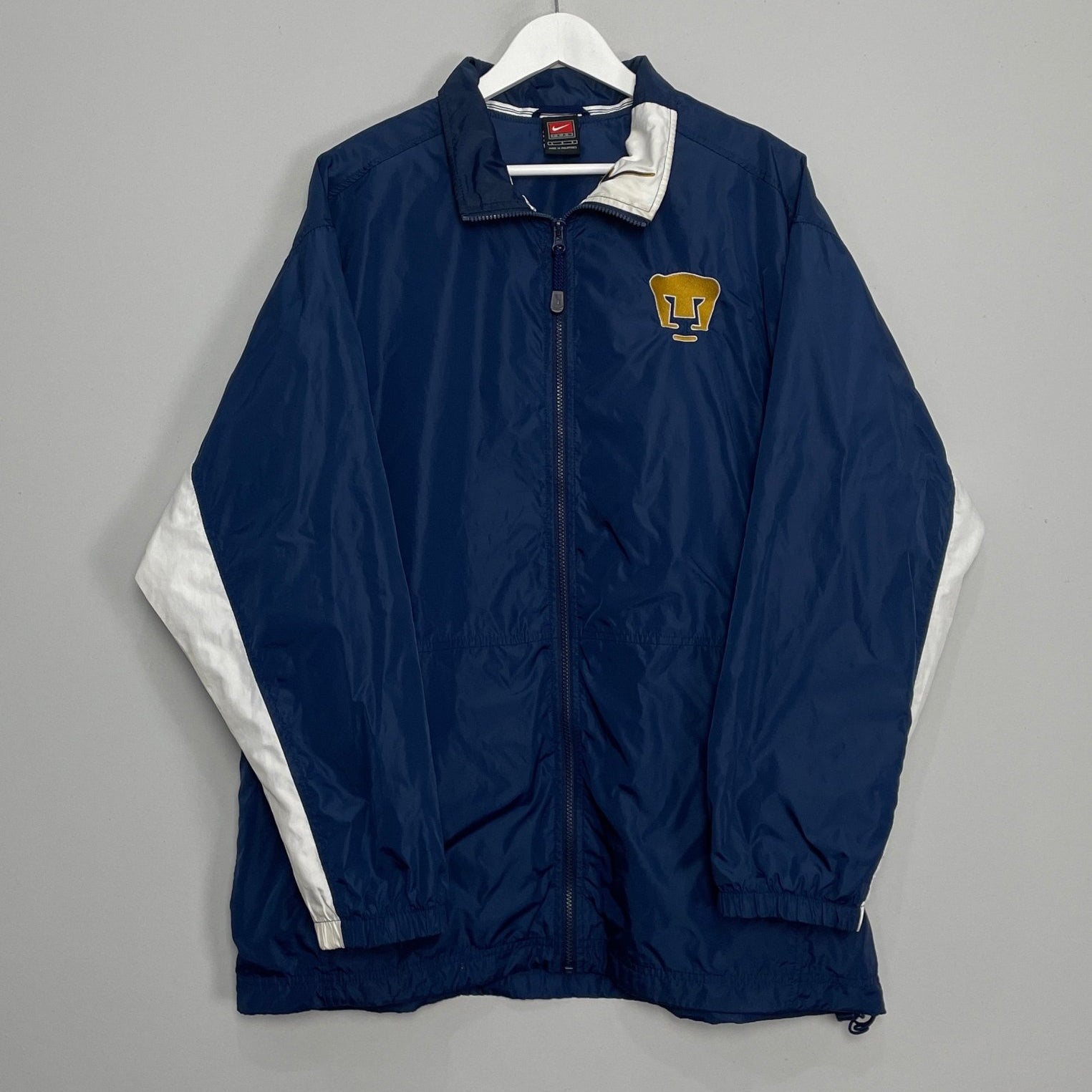 Shop 2002/03 UNAM PUMAS TRACK JACKET (L) NIKE, classic football shirts, vintage football shirts & retro soccer jerseys at Cult Kits