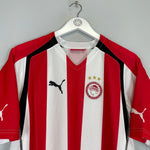 Shop 2005/06 OLYMPIAKOS *BNWT* HOME SHIRT (XL) PUMA, classic football shirts, vintage football shirts & retro soccer jerseys at Cult Kits