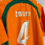 Shop 2006/07 IVORY COAST TOURE #4 HOME SHIRT (L) PUMA, classic football shirts, vintage football shirts & retro soccer jerseys at Cult Kits