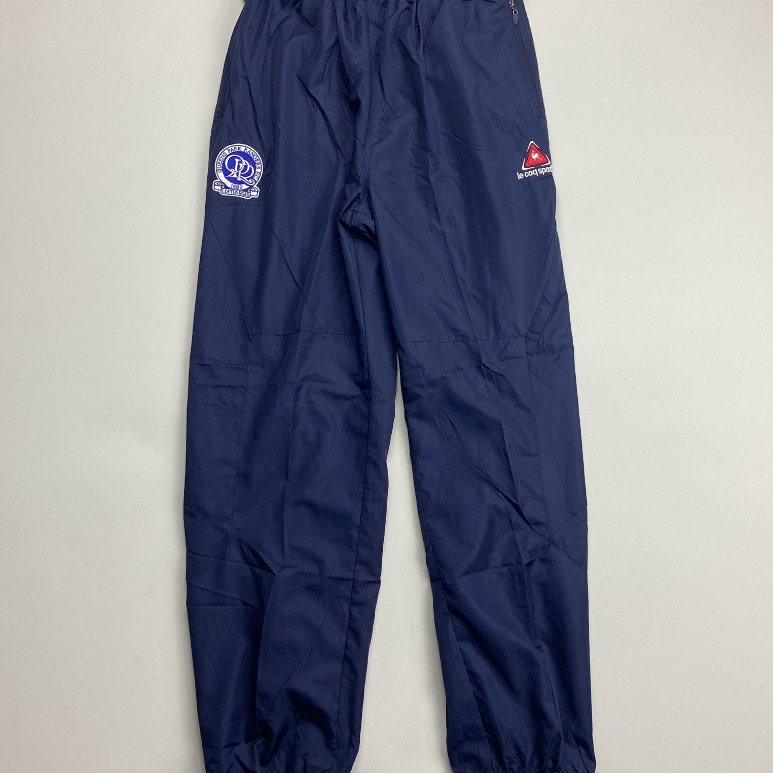 Shop 2006/07 QPR TRACKSUIT BOTTOMS (XL) LE COQ, classic football shirts, vintage football shirts & retro soccer jerseys at Cult Kits