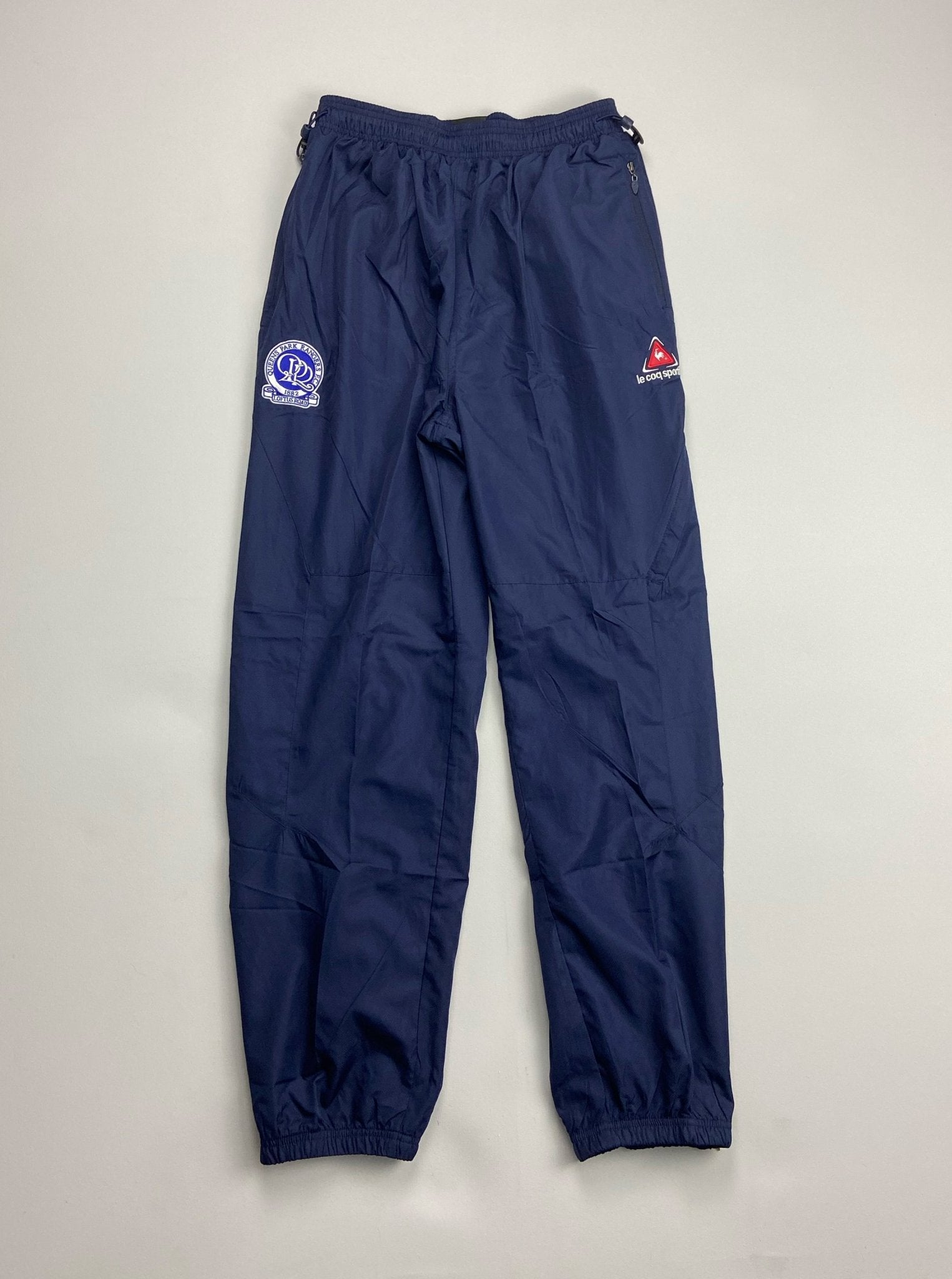 Shop 2006/07 QPR TRACKSUIT BOTTOMS (XL) LE COQ, classic football shirts, vintage football shirts & retro soccer jerseys at Cult Kits